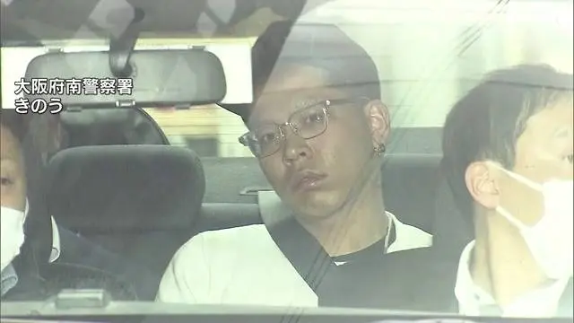 大阪道頓堀少年刺殺案，21歲疑兇因騷擾少女遭制止釀衝突。(TBS News 截圖)
