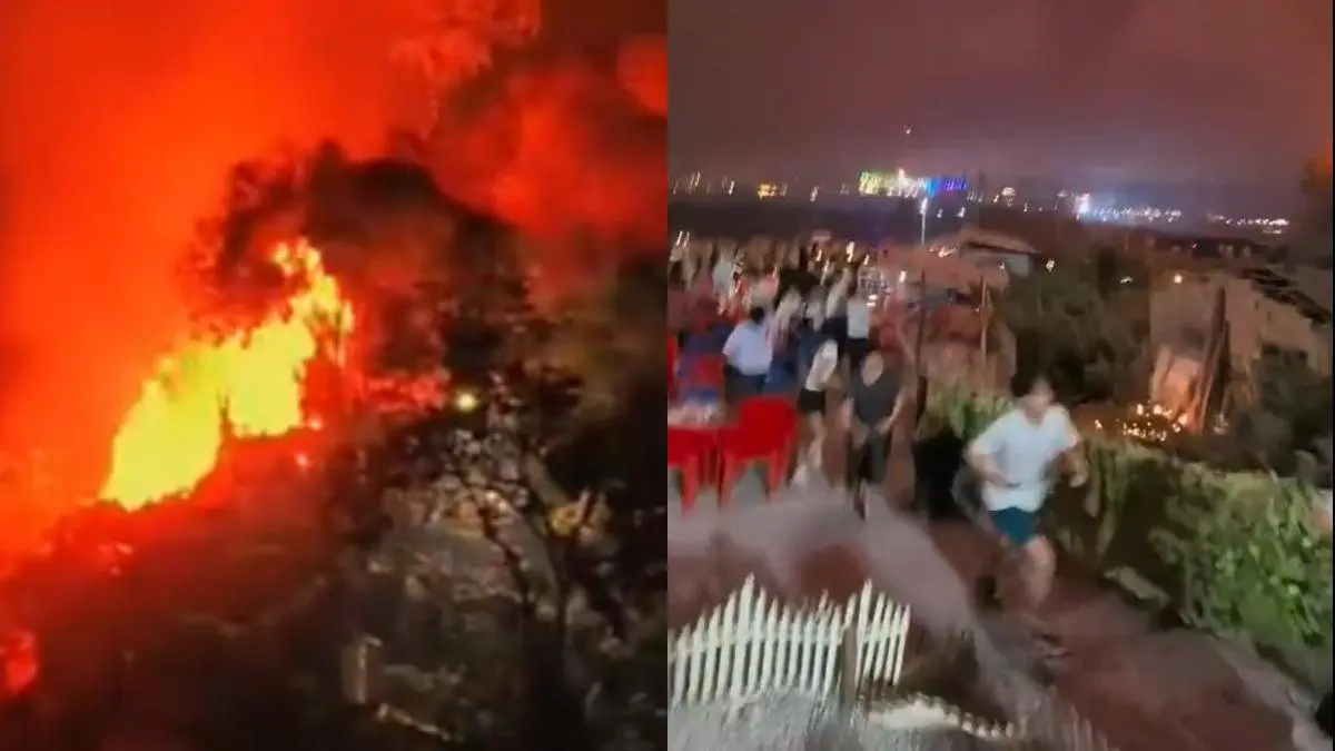民眾拍攝的視頻顯示，觀眾紛紛向安全區域逃離，山坡上的火光與空中的演出光影形成強烈對比，現場一度混亂。​(圖：視頻翻攝)
