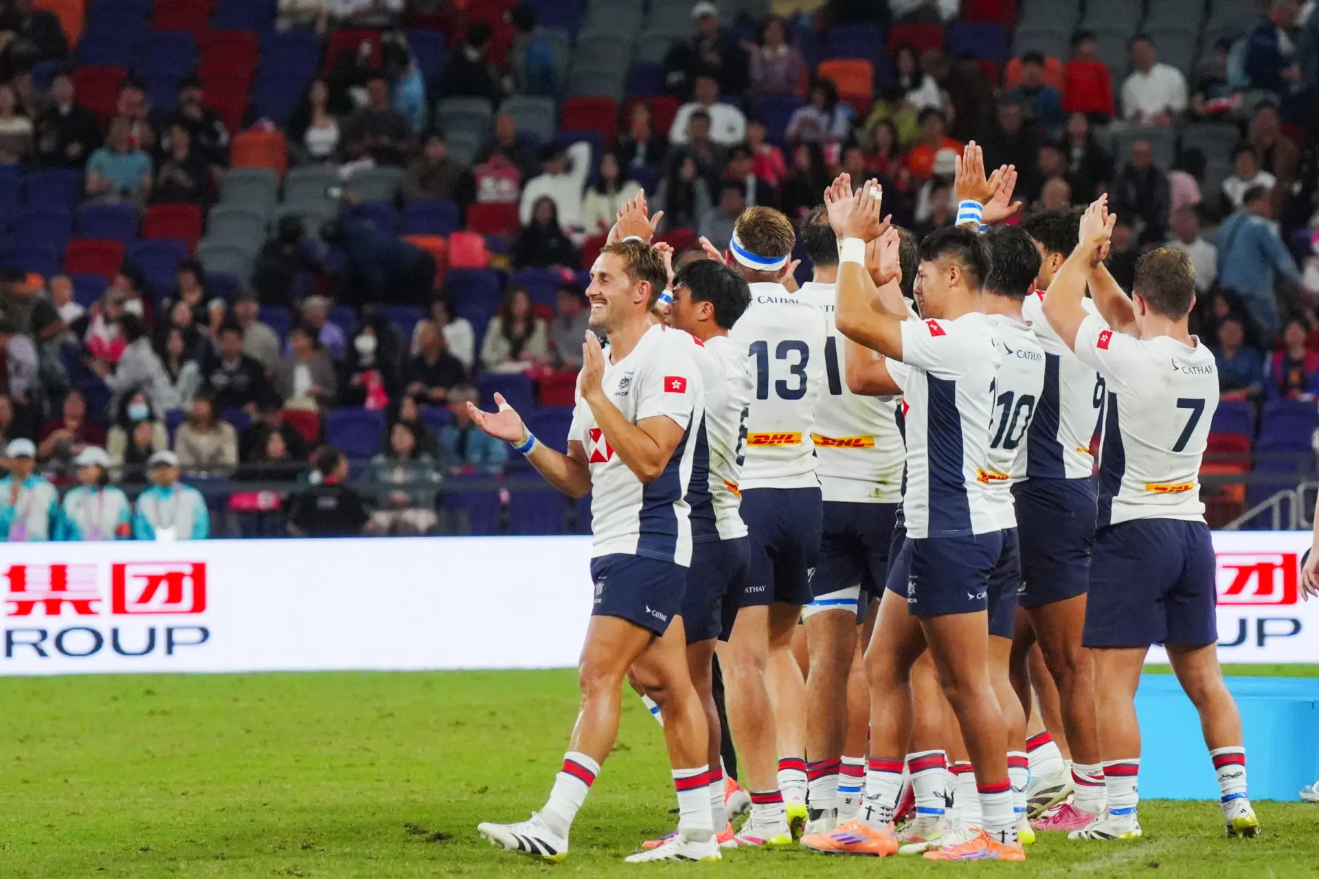 在香港舉行的第十五屆全國運動會7人制橄欖球男子金牌賽中，香港隊以26比19擊敗山東隊，奪冠。(圖：新華社)