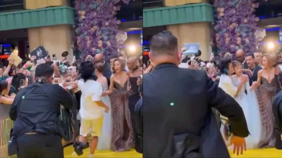 亞莉安娜格蘭德新加坡紅毯遭網紅 Pyjama Man 衝撞 辛西婭艾利沃即時護航獲讚的封面圖片
