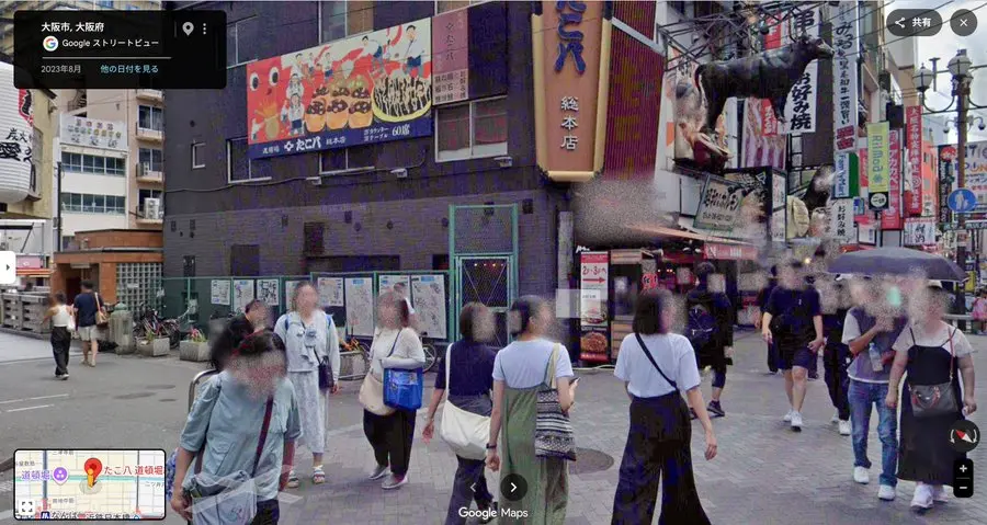 大阪道頓堀商圈爆發離譜街頭衝突，疑日、韓兩名女子當街激烈扭打，同行男子強硬阻擋路人勸架，相關影片於X平台破千萬觀看，引發全球網友熱議與多方討論。（來源：mideum1004@X）