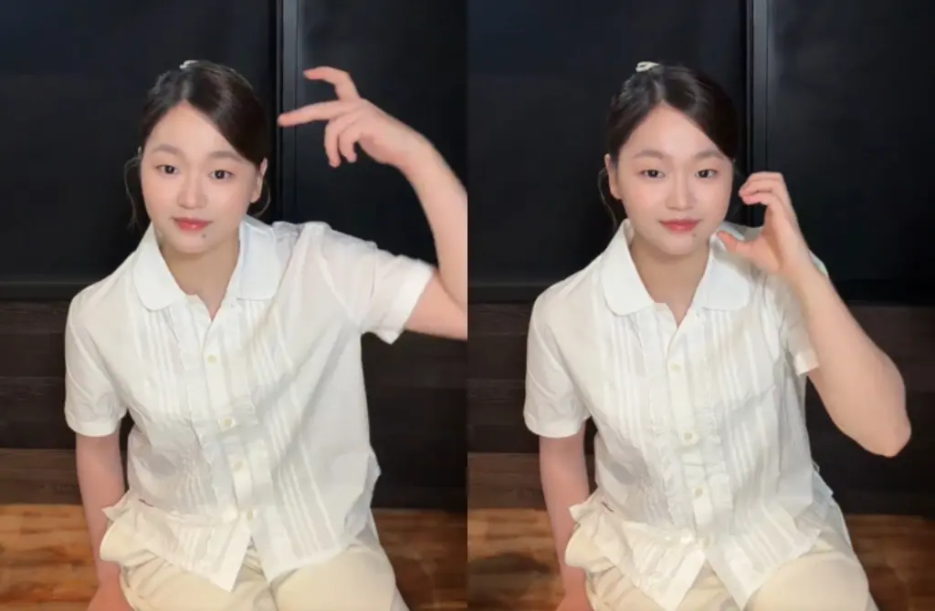 大會安排趣味環節，安排全紅嬋現場學習上海話，她認真模仿本地口音，略生澀的表現引得全場歡笑。其後她亦跟隨音樂表演手勢舞，沒有距離感，如鄰家少女般活潑。(圖：微博)